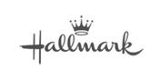The image shows the word "Hallmark" in a cursive font with a crown symbol above the letter "m," evoking an elegant touch, much like a premium Toronto catering service.